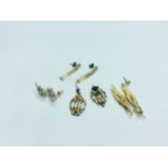 Four pairs of various design 9ct gold earrings, including a pair set with blue and white stones,