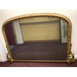 A 19th century overmantel mirror, of rectangular form, with slightly domed top and original glass