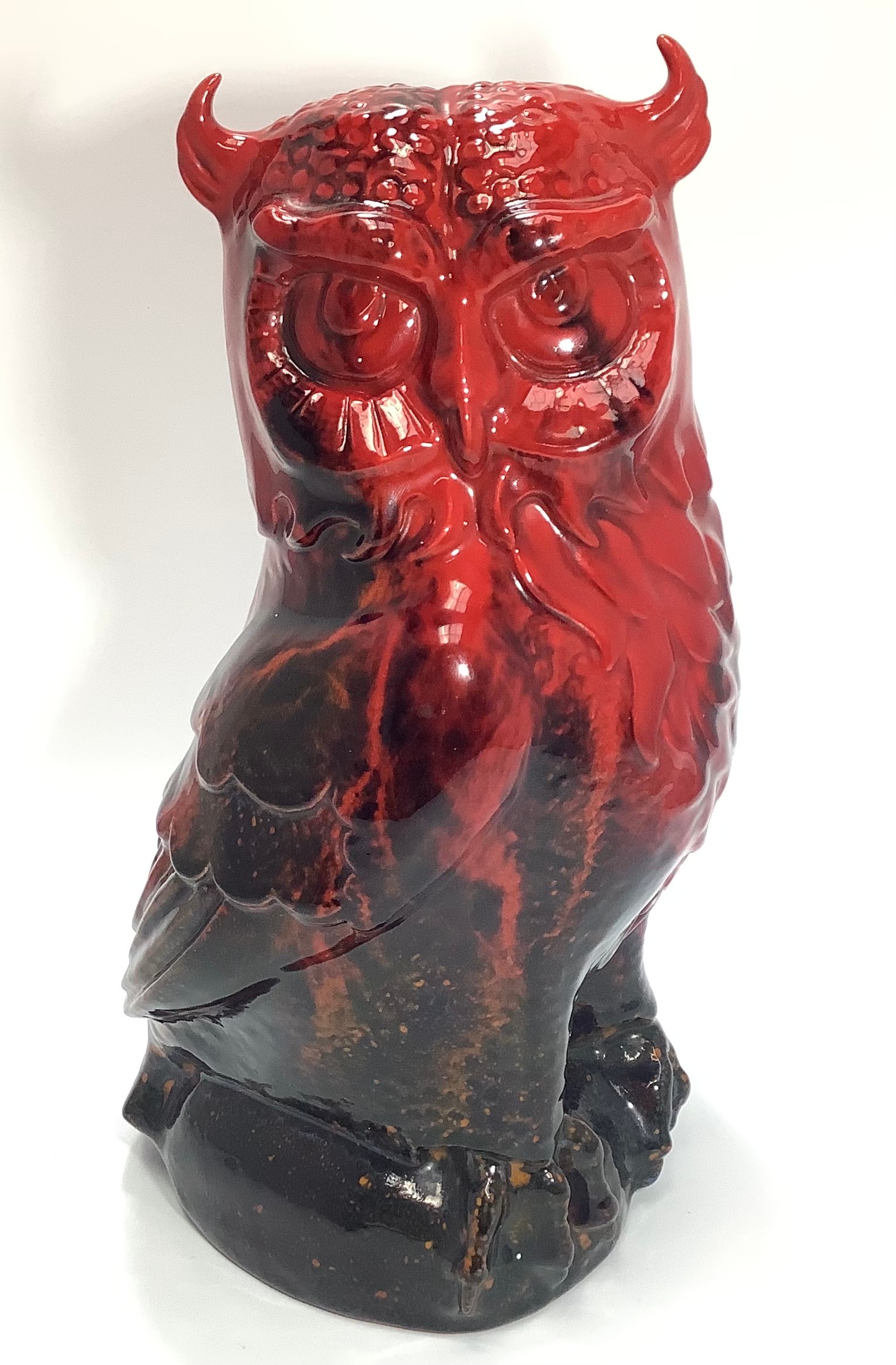 A large Royal Doulton veined Flambé model of an Owl, sat on an oval base, 29cm tall