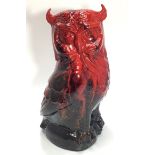 A large Royal Doulton veined Flambé model of an Owl, sat on an oval base, 29cm tall