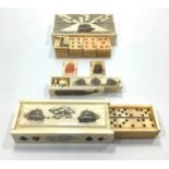 Two various boxed sets of miniature bone dominos and a full set of miniature bone playing cards,