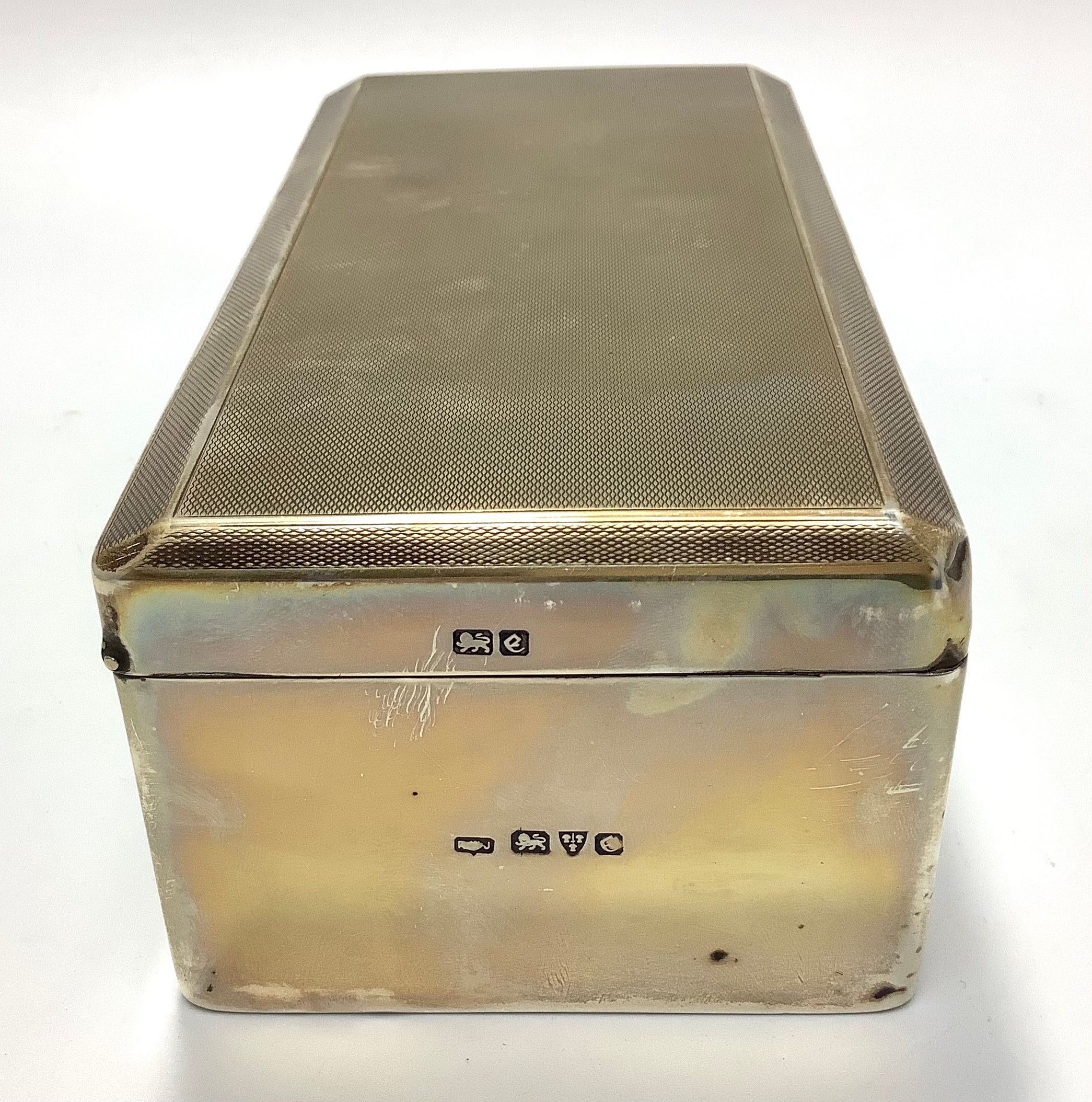 A cedar lined silver cigarette box with engine turned decoration, Chester, 1930 maker's initials - Image 3 of 3