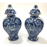 A pair of 18th Century Delft pottery vases of inverted baluster form with chinoiserie decoration,