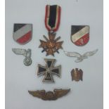 WW2/ Nazi interest: A 1939 Iron Cross 1st Class, War Merit Cross 2nd Class, two tricolour shield