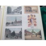 Approximately 350 cards of Northamptonshire towns and villages in an album, both real photographic