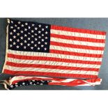 Two large ships USA flags with stars and stripes, one marked 6BDTH 1992 made by Zephyr Flags,