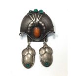 A Danish Georg Jensen silver art deco brooch, arched top set with three chrysoprase stones above a