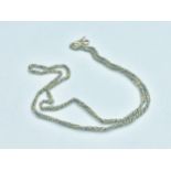 A 9ct yellow gold close link twist chain, weighing 10.3 grams, measuring 20 inches in length.