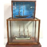 A large model of the tall ship Torridon, with rigging, raised on plinth base, in large glazed