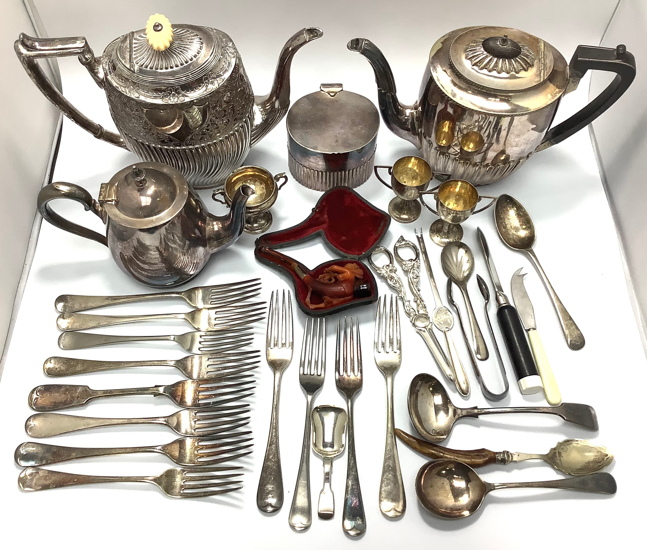 A small collection of assorted silver and silver-plated wares comprising a silver caddy spoon and