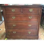 A mahogany chest of drawers with two short over three long drawers with brass pull handles, 104cm