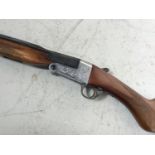 A 12-bore single barrel shotgun by Acciaio, made in Italy, 28-inch poacher's 'style' folding barrel,