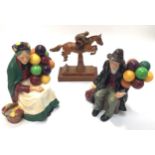 Two Royal Doulton figures 'The Old Balloon Seller' HN1315 together with 'The Balloon Man' HN1954 and