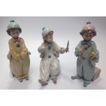 Three Lladro porcelain Clown / Pierrot figures including 'Pierrot in Preparation' No. 6257, 'Pierrot