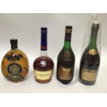 Four bottles of spirits including Remy Martin Champagne Cognac, Napoleon Vieil Armagnac Sempe,