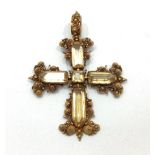 An antique continental yellow metal cross (tests as 18ct gold), with ornate filigree work and set