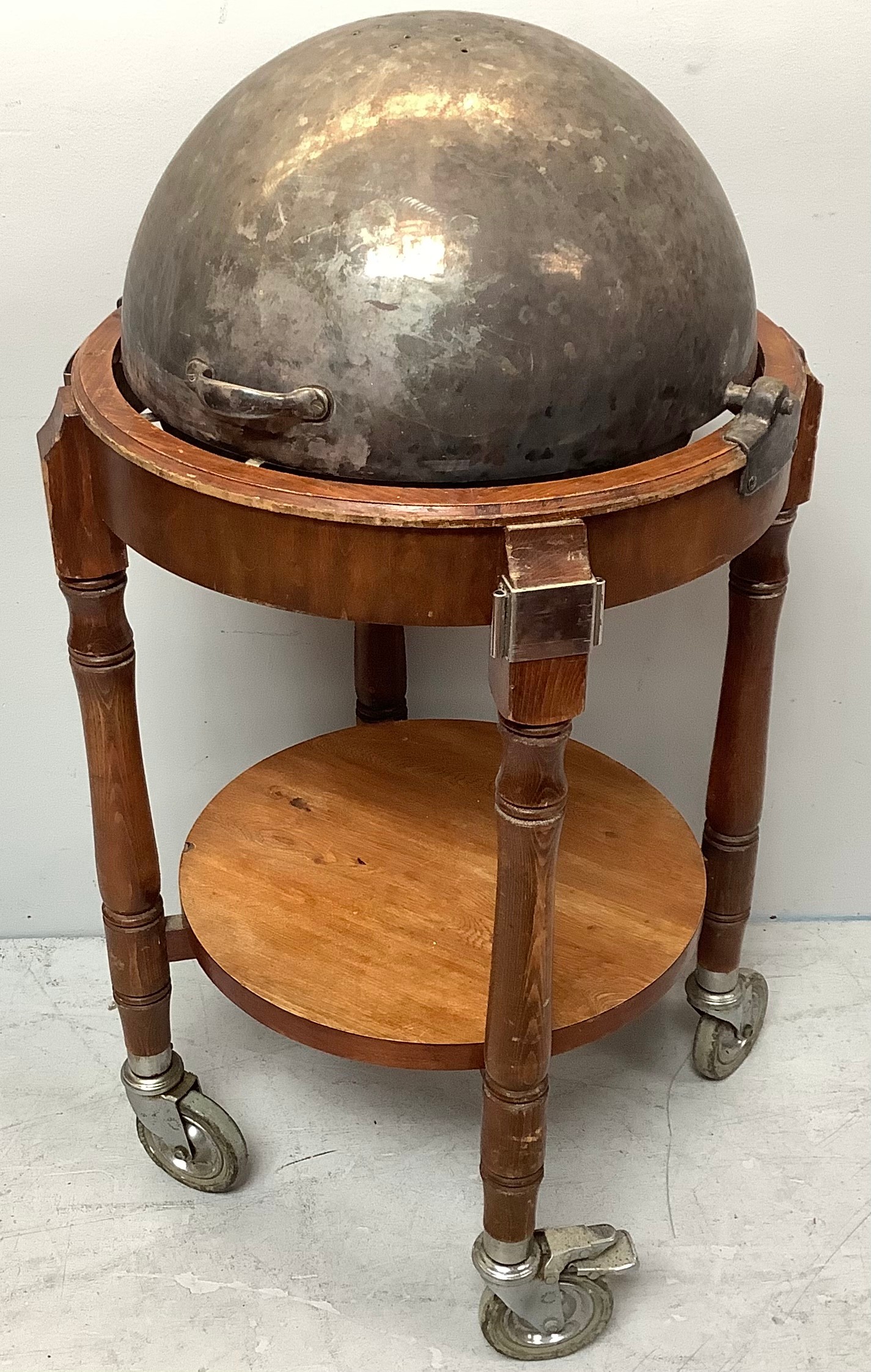 A large circular silver-plated serving trolley, (From 'The Queen's Hotel, Southsea),with folding