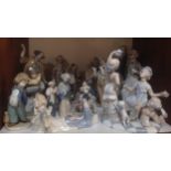 A 'Shudder' of Spanish porcelain clowns / pierrot including a large Casades figure group of three