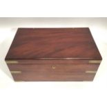 A Victorian mahogany campaign folding writing slope with brass corners, twin side drawers with brass