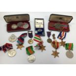 Two various boxed ERII Imperial Service medals each together with a set of ID/dog tags for 1442677