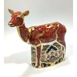 A Royal Crown Derby paperweight, 'Sherwood Hind', with printed marks to base and gold stopper,