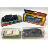 Four various Dinky Toys models including a metallic blue Rolls Royce Phantom V No. 124, a dark