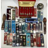 A large quantity of silver plated commemorative and collectors spoons, some boxed