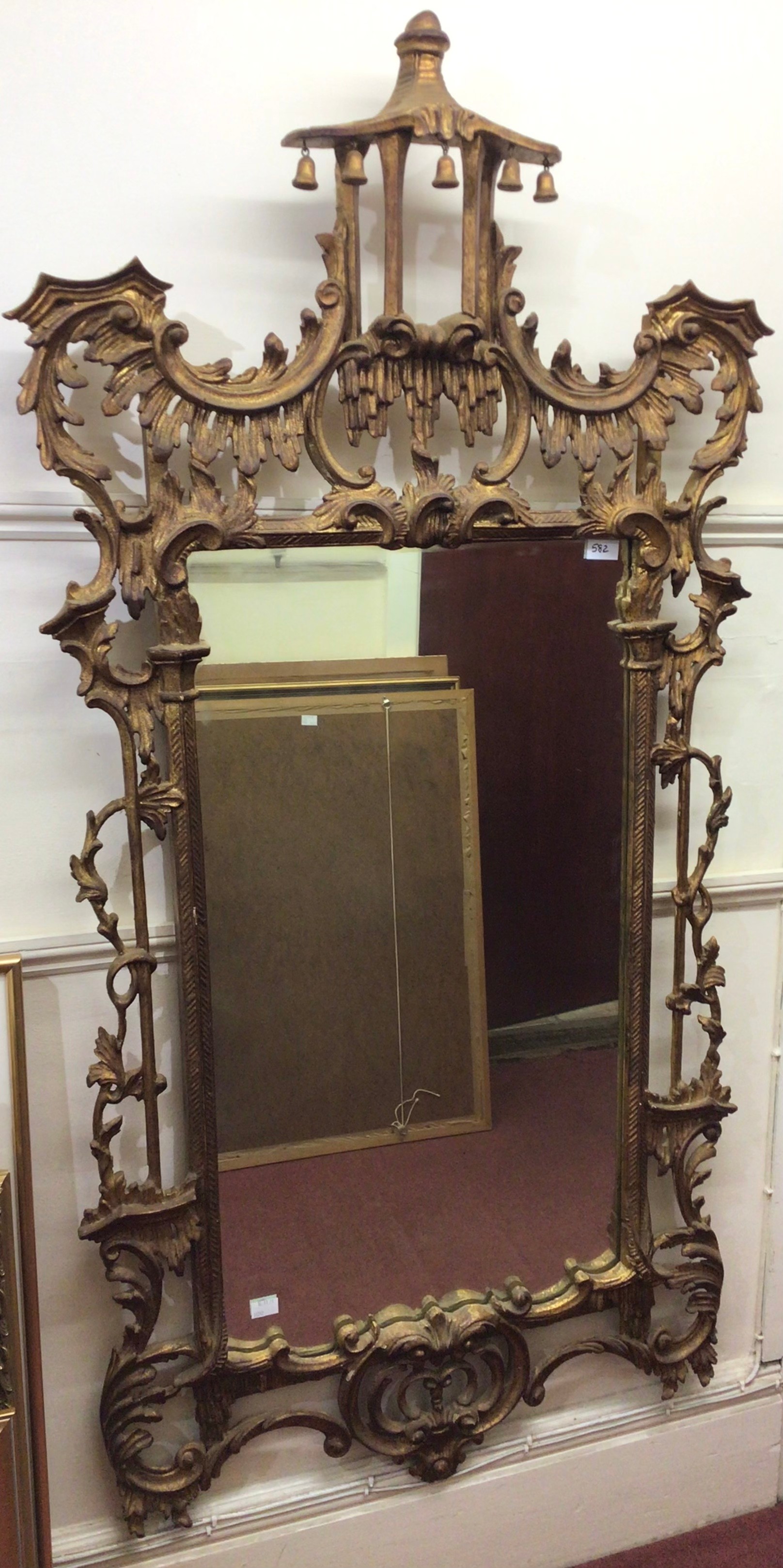 A 19th century Italian gilt gesso mirror in the Chinese Chippendale style, surmounted with a