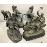 Two various cast metal figure groups of knights on horseback, on naturalistic bases, 46cm high