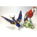 Two Royal Crown Derby paperweights, 'Swallow' and 'Scarlet Macaw', an exclusive for the Collectors