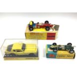 Three various Dinky Toys models including a yellow Jensen FF No. 188, in perspex display case, a red