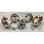 Five Royal Crown Derby paperweights including a pair of Imari pigs a pair of Imari Hedgehogs, and