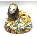 A Royal Crown Derby paperweight, 'Nemean Lion', with printed marks to base and gold stopper,