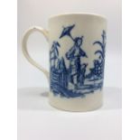 An 18th century Caughley porcelain tankard, with loop handle and printed in underglaze cobalt blue