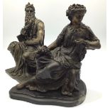 A bronze figure of a seated classical maiden eating grapes, on shaped base, 26cm high, together with