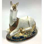 A Royal Crown Derby paperweight, 'Unicorn', with printed marks to base and gold stopper, limited