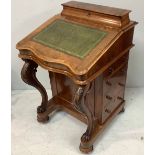 A Victorian walnut Davenport with raised stationery compartment, gilt tooled green leather scribe,