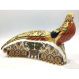 A Royal Crown Derby paperweight, 'Harrods Pheasant', with printed marks to base, gold stopper and