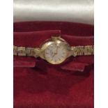 A ladies 9ct gold Rotary cocktail watch with textured bracelet, in original box, 13.07g gross. (