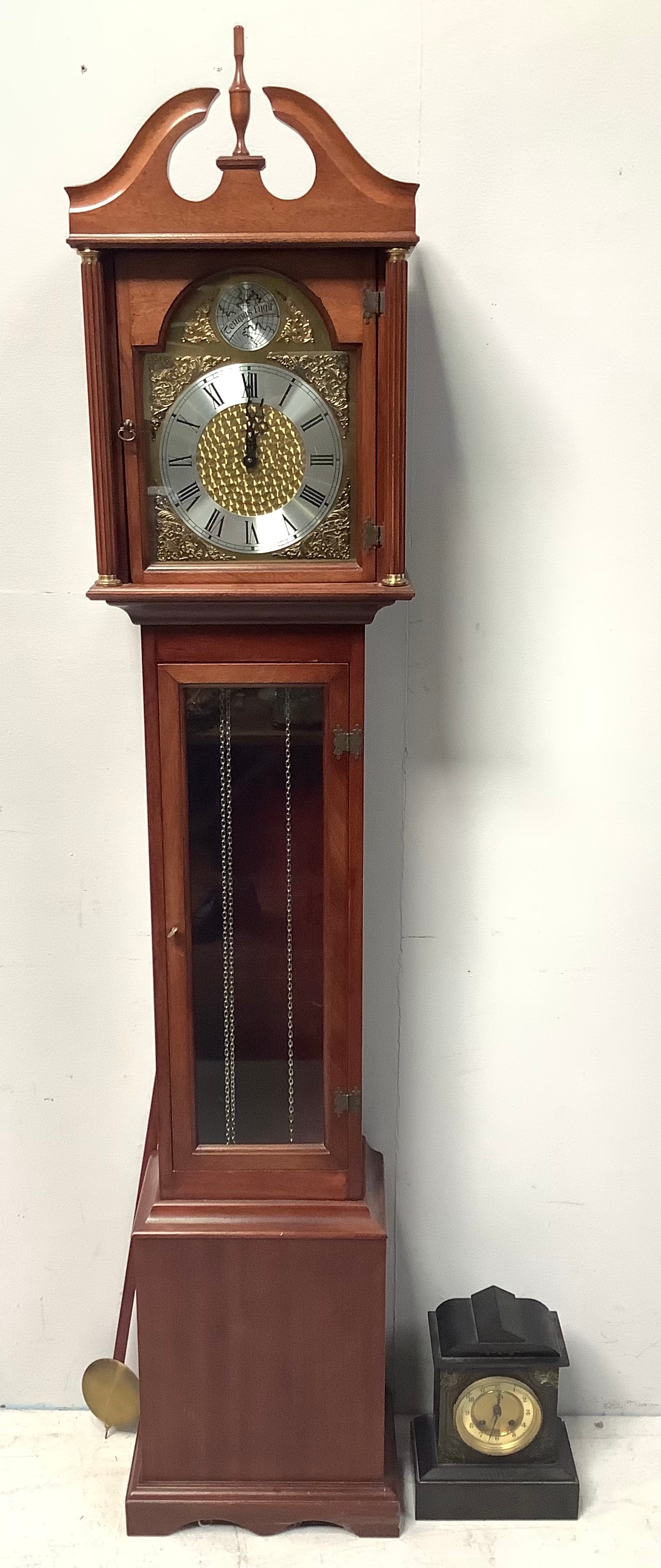 A modern mahogany long case clock with silvered chapter ring and gilt spandrels, marked 'tempus
