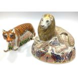 Two Royal Crown Derby paperweights comprising 'Lion' and 'Sumatran Tiger', both with printed marks