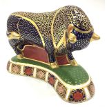 A Royal Crown Derby paperweight 'Bull', with printed marks to base and gold stopper, boxed, 20cm