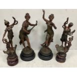 A pair of bronzed female figures 'La Musique' and 'La Danse', together with another pair of