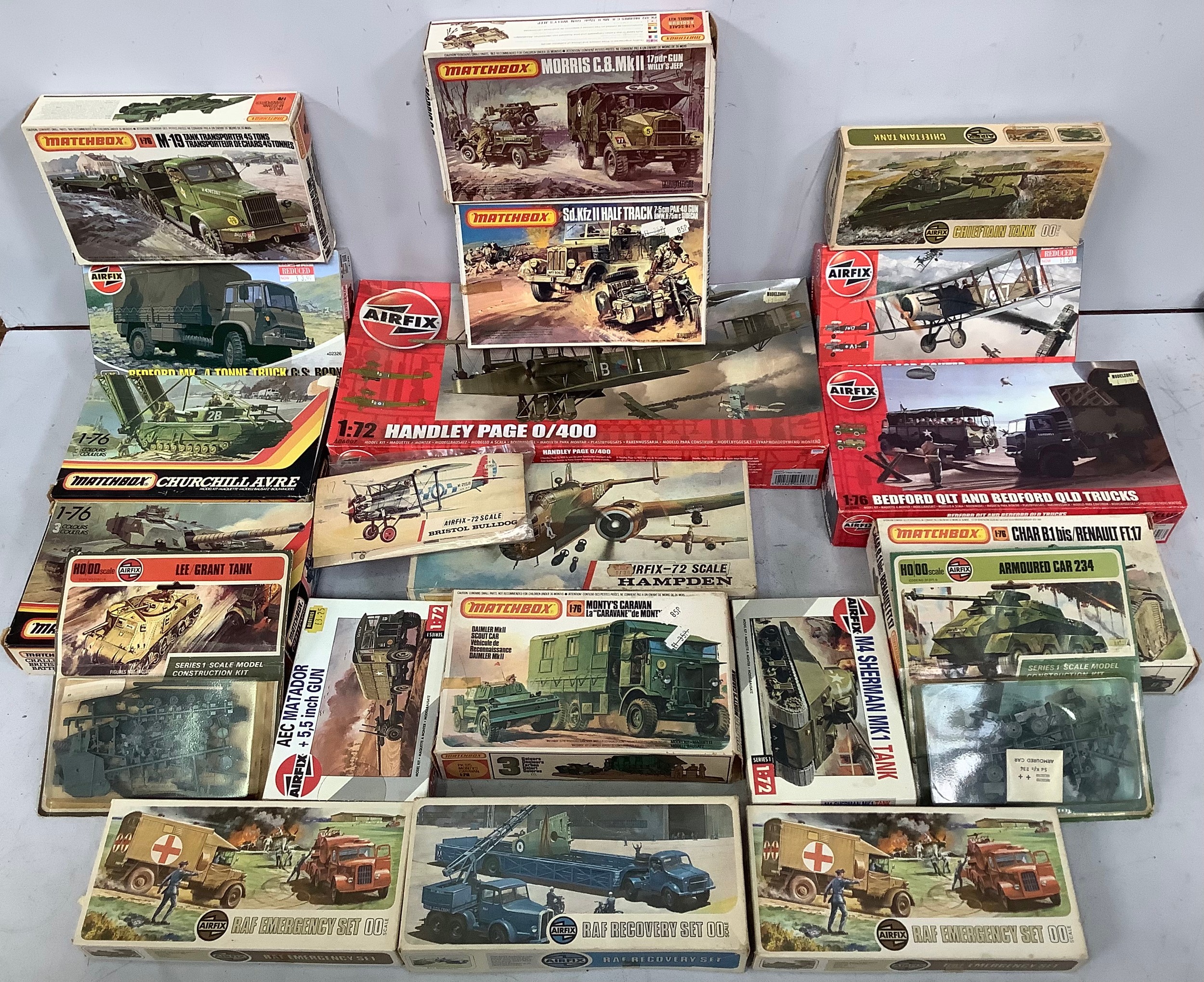 A collection of 21 boxed military themed model kits from Airfix and Matchbox, 1:72/1:76 scale.