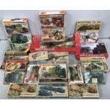 A collection of 21 boxed military themed model kits from Airfix and Matchbox, 1:72/1:76 scale.