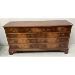 A 20th century mahogany sideboard by Reprodux for Bevan Funnell Ltd, the top with canted corners and