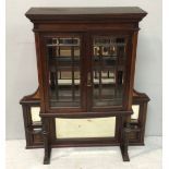 An Edwardian inlaid mahogany display cabinet top with shaped cornice above a pair of bevelled glazed