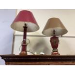 A pair of reproduction Toleware lamps, painted red with gilding