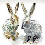 Two Royal Crown Derby paperweights comprising 'Winter Hare' and 'Starlight Hare', exclusive for