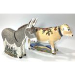 Two Royal Crown Derby paperweights, 'Donkey' and 'Lily The Cow', both with printed marks to bases